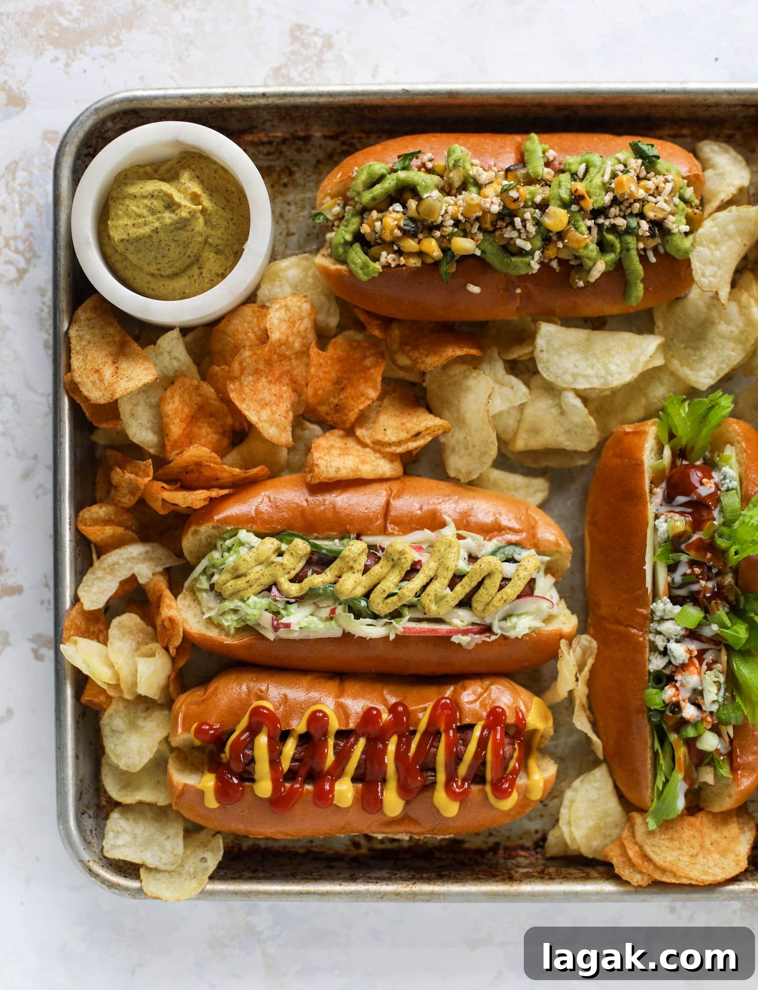 Throw a Hot Dog Bar This Weekend + 7 Gourmet Hot Dog Ideas 15 Nothing screams summer more than a hot dog bar! Grab your buns and dogs and a whole lot of toppings. This is super fun and delicious!