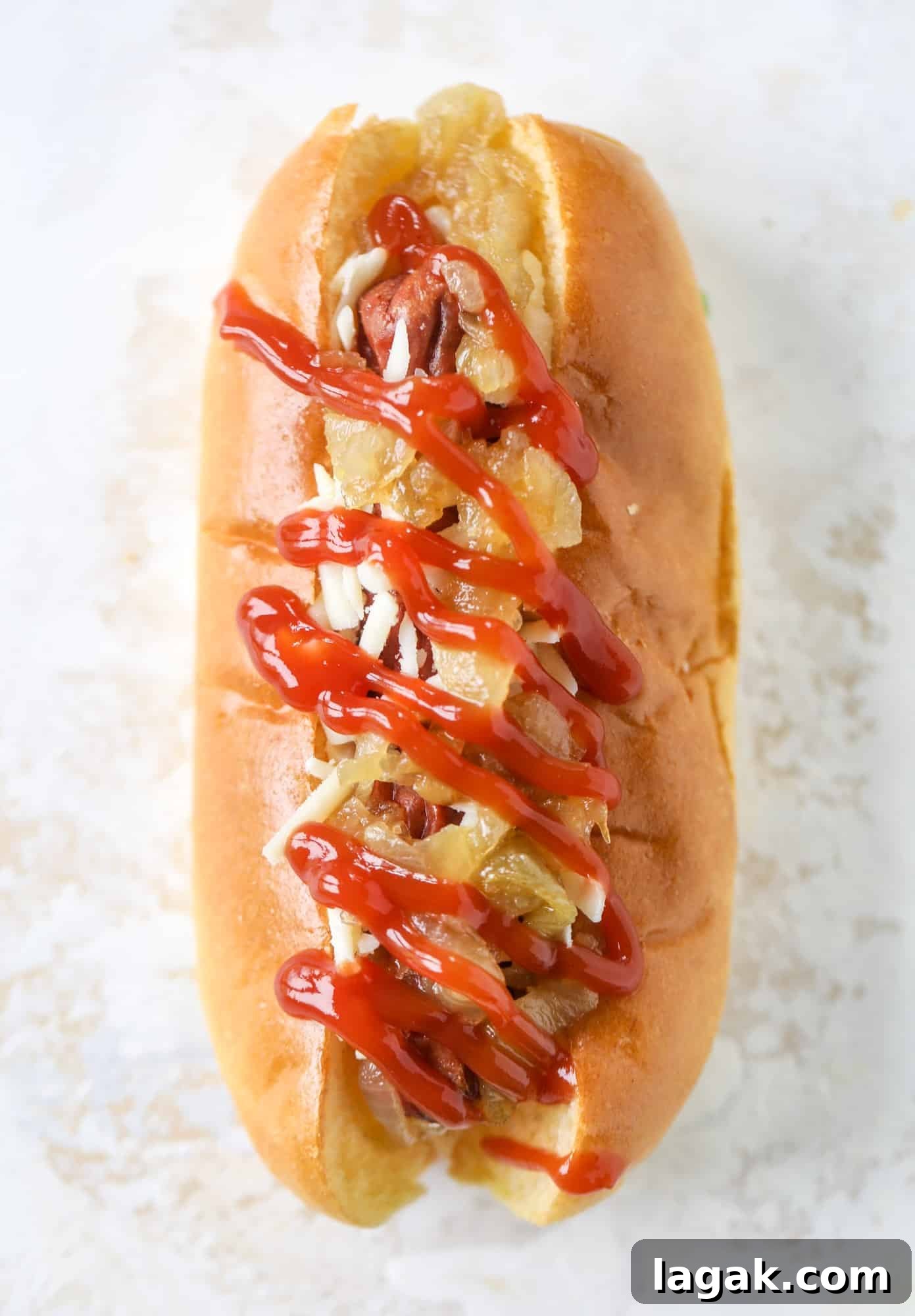Throw a Hot Dog Bar This Weekend + 7 Gourmet Hot Dog Ideas 10 caramelized onion cheddar dog