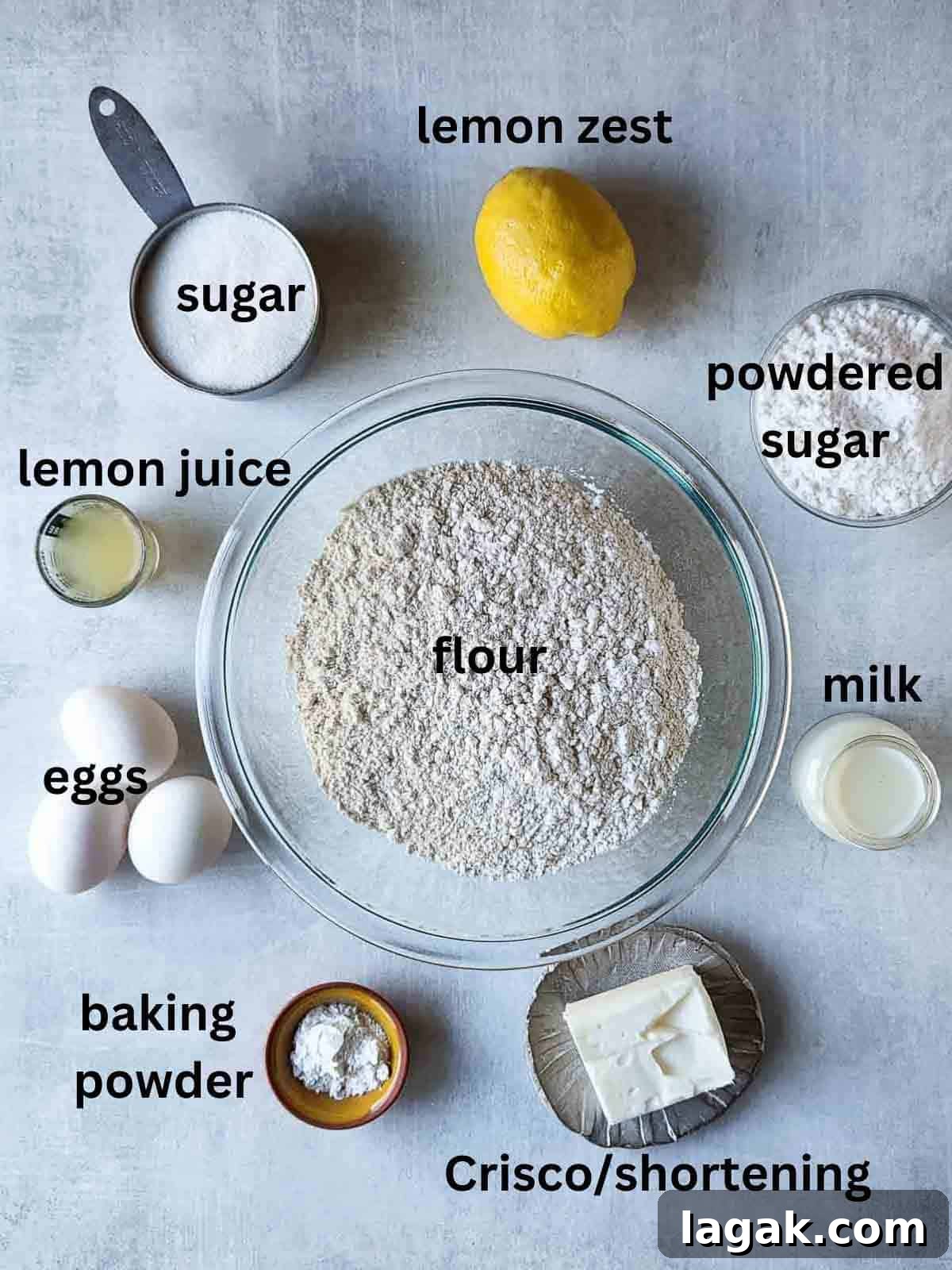 Italian Lemon Drop Cookies Recipe — Zesty Citrus Biscotti-Style Treat 3 Ingredients for Italian lemon drop cookies on a grey surface.