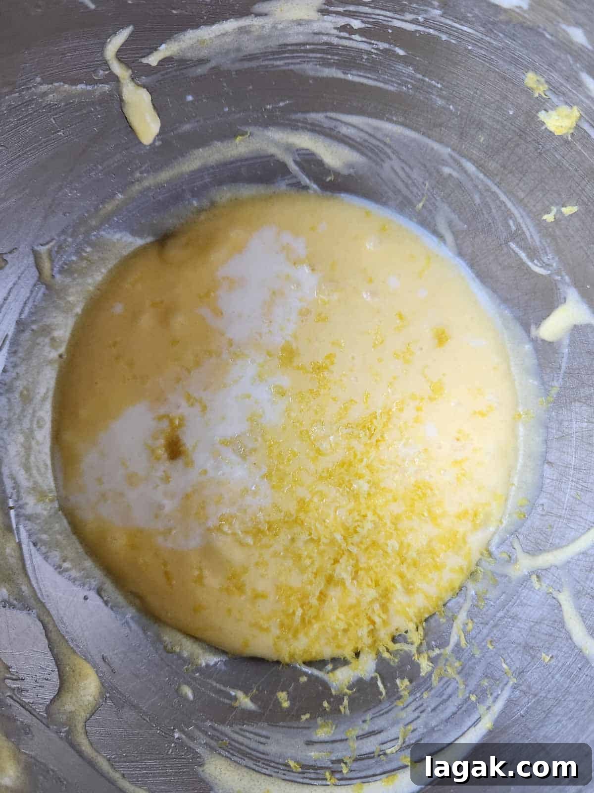Italian Lemon Drop Cookies Recipe — Zesty Citrus Biscotti-Style Treat 5 Wet batter in a mixing bowl.