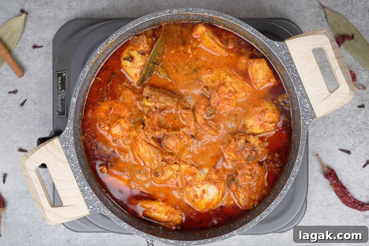 Chicken Angara Recipe: Spicy Grilled Chicken with Smoky Sauce 13 Cooked chicken curry.