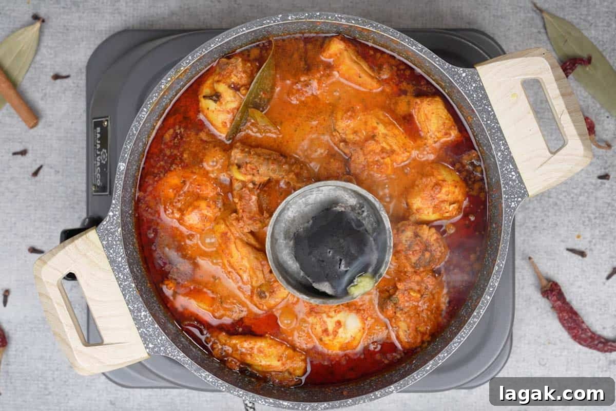 Chicken Angara Recipe: Spicy Grilled Chicken with Smoky Sauce 15 Ghee drizzled over hot charcoal.