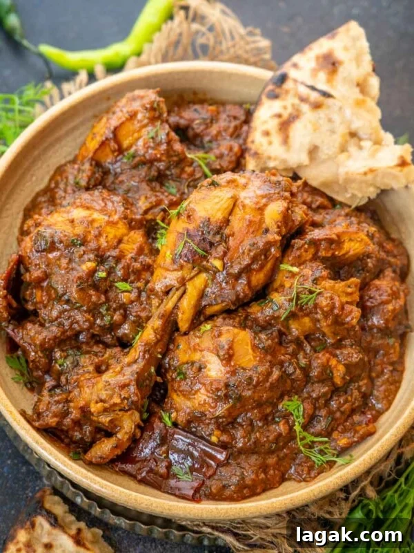 Chicken Angara Recipe: Spicy Grilled Chicken with Smoky Sauce 20 Dhaba Style Chicken Curry in a bowl.