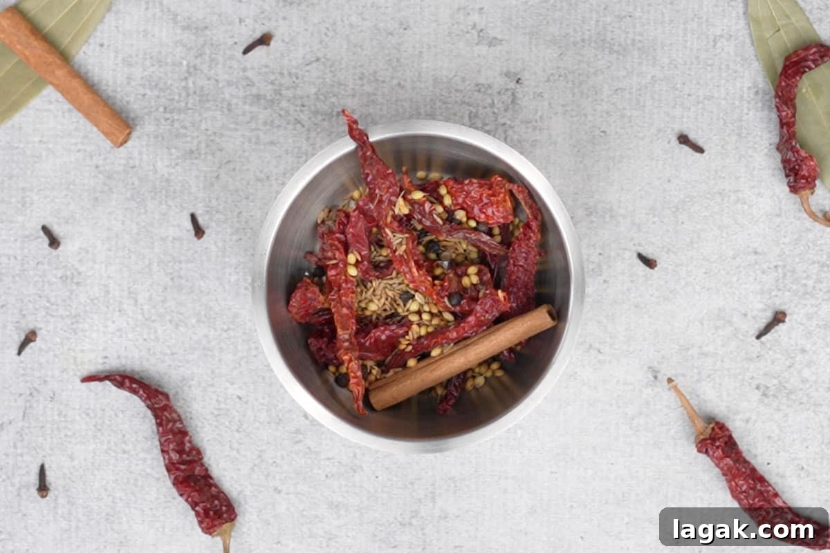 Chicken Angara Recipe: Spicy Grilled Chicken with Smoky Sauce 7 Cooled roasted ingredients added to a blender.