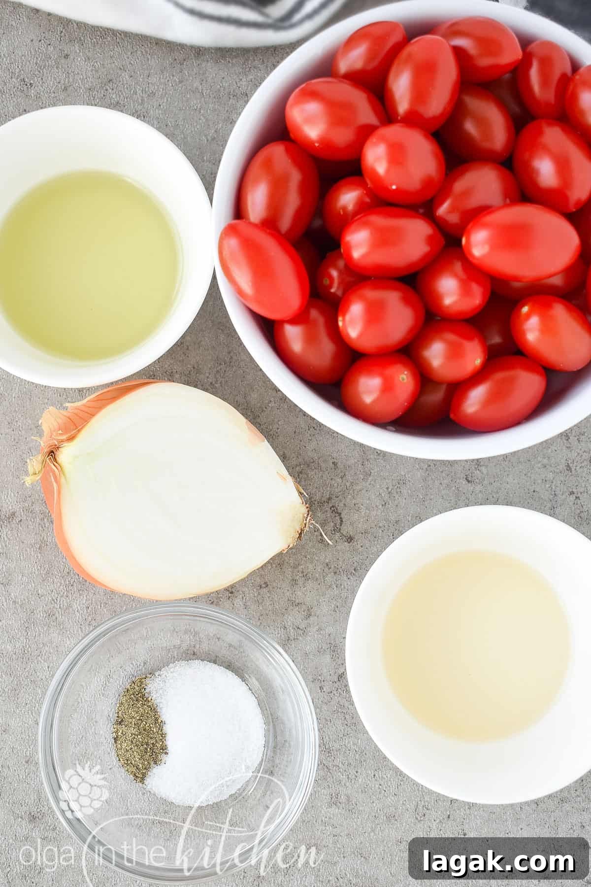 This super Quick Tomato Salad is a summer favorite at every BBQ party. Simple, fresh and delicious and only takes 10 minutes to put together! | olgainthekitchen.com