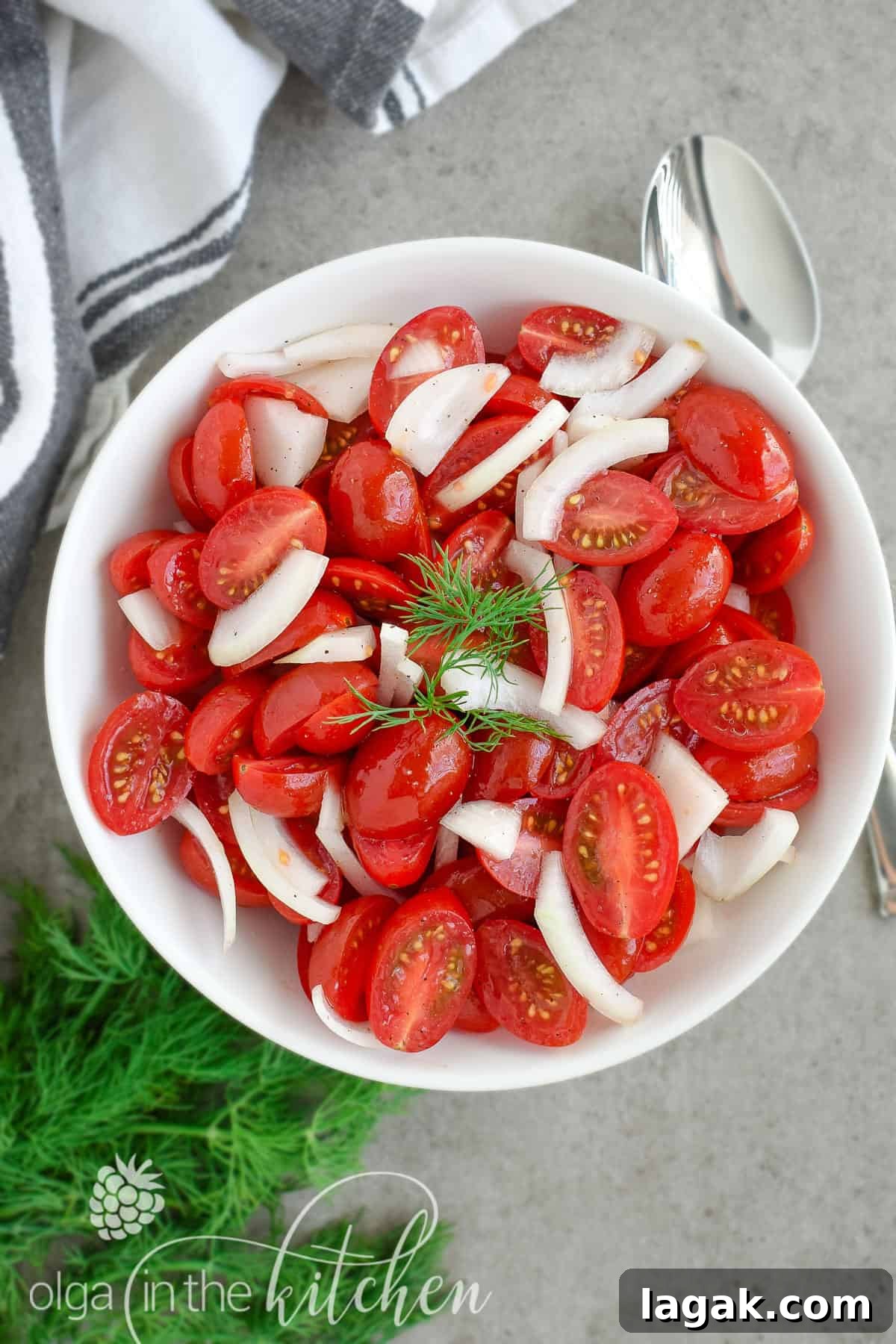 This super Quick Tomato Salad is a summer favorite at every BBQ party. Simple, fresh and delicious and only takes 10 minutes to put together! | olgainthekitchen.com