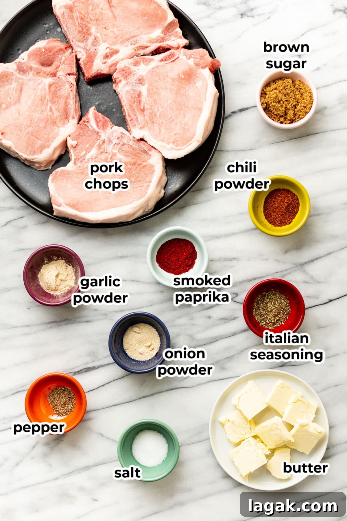 Juicy Oven-Baked Pork Chops with Garlic and Herbs 3 ingredients for baked pork chops in prep bowls