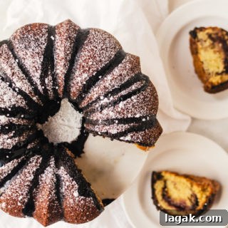 Everyone will fall in love with this raspberry chocolate coffee cake with a surprise jam filling