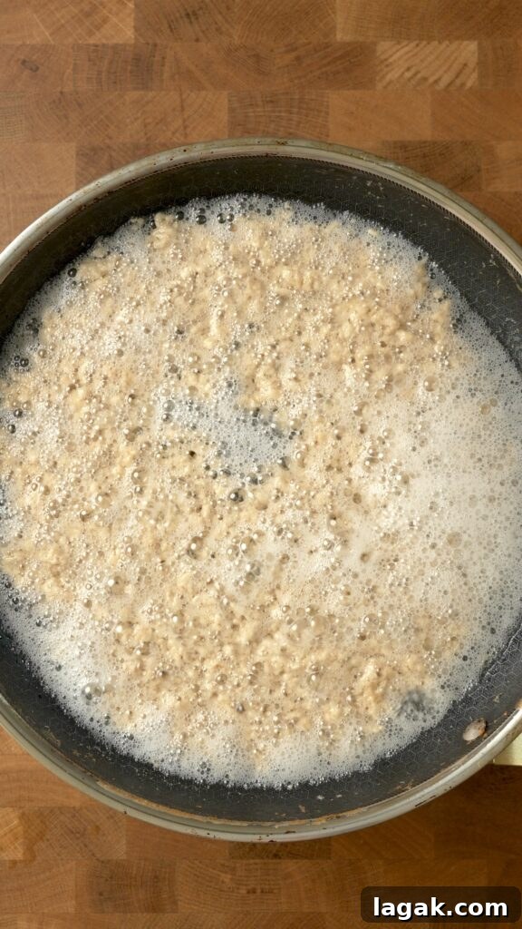 How to Make Latik Coconut Curds at Home 11 Nearly full separation of oil and solids have occurred