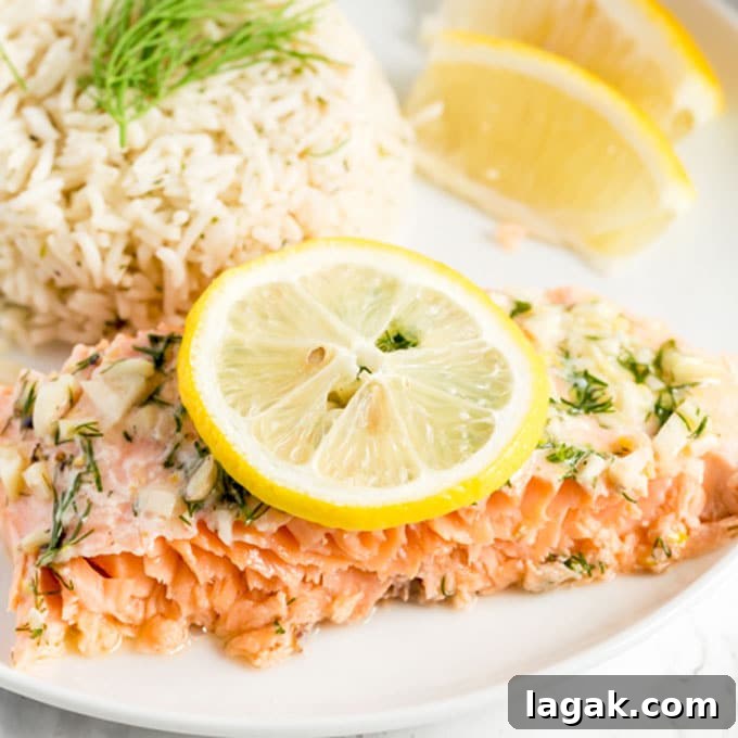 14 Romantic Valentine's Day Recipes to Make at Home 9 A piece of salmon served with rice and garnished with sliced lemons.
