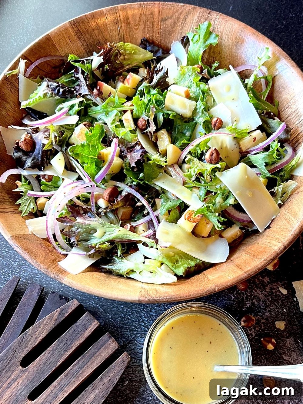 Autumn Harvest Salad with Honey Apple Cider Vinaigrette 2 Bowl with greens and dressing on the side.