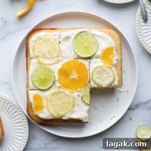 Moist Buttermilk Citrus Cake with Zesty Lemon Glaze 5 A citrus cake with slices taken out