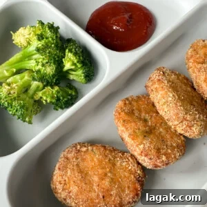 Crispy Chicken Nuggets with Veggie Dip and Hidden Veggies 13 Veggie chicken nuggets served with broccoli and ketchup.