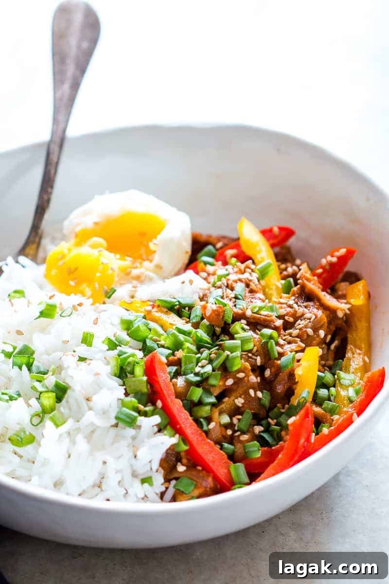 Easy Slow Cooker Korean Pork Bulgogi recipe that can be made in a crockpot and has spicy gochujang in its marinade. Healthy, yummy stew that's perfect over rice for dinner!