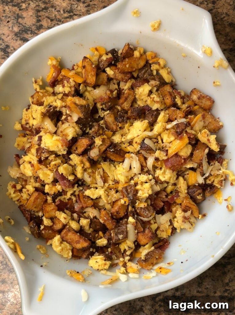 Smothered Breakfast Burritos: Fully Loaded Morning Burrito Recipe 18 Loaded Smothered Breakfast Burritos