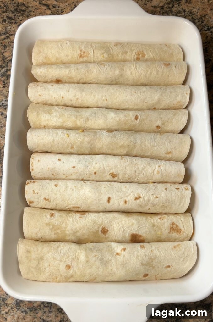 Smothered Breakfast Burritos: Fully Loaded Morning Burrito Recipe 20 Loaded Smothered Breakfast Burritos