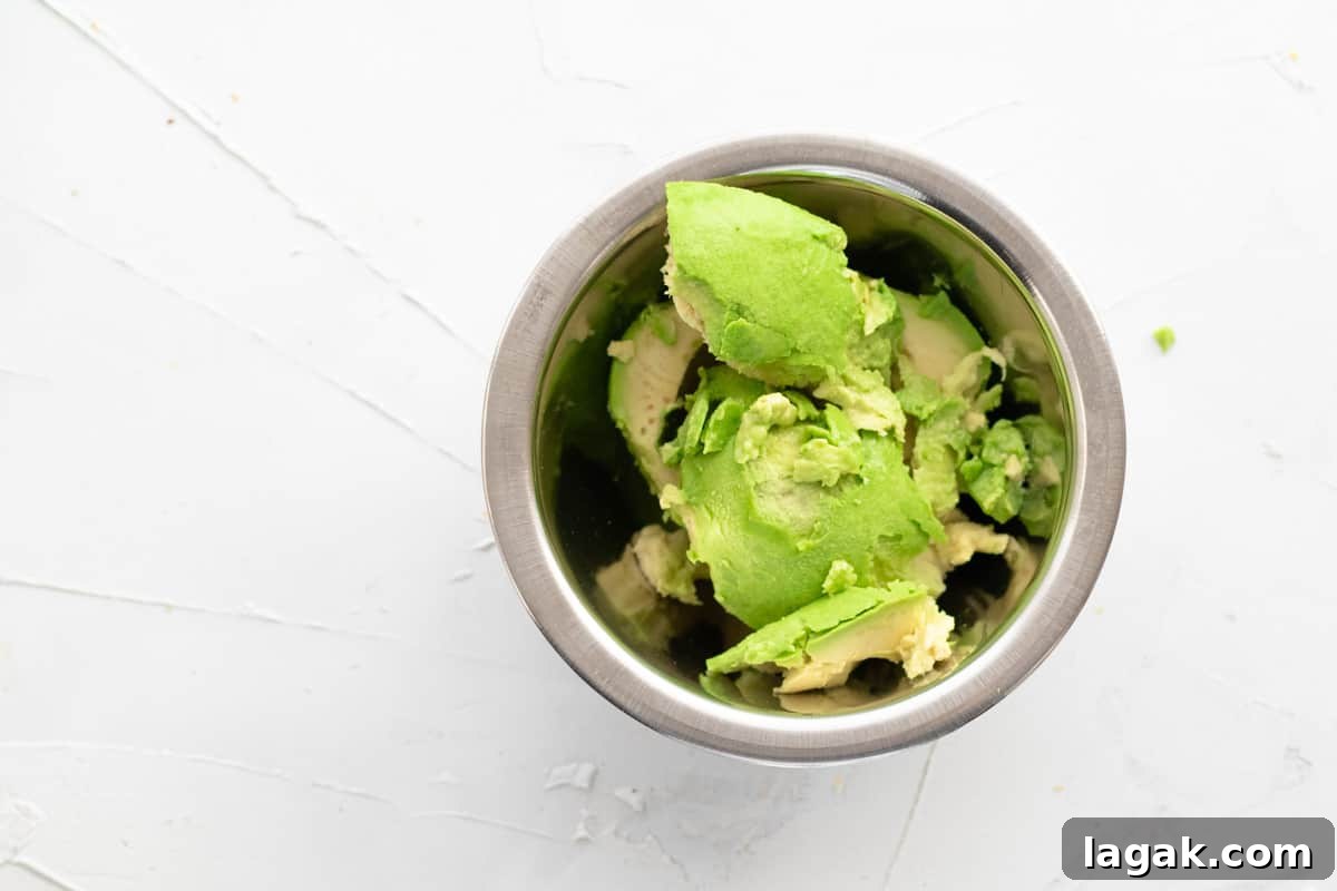 3-Ingredient Dunkin’ Style Avocado Toast Recipe 5 ripe avocado in a prep bowl