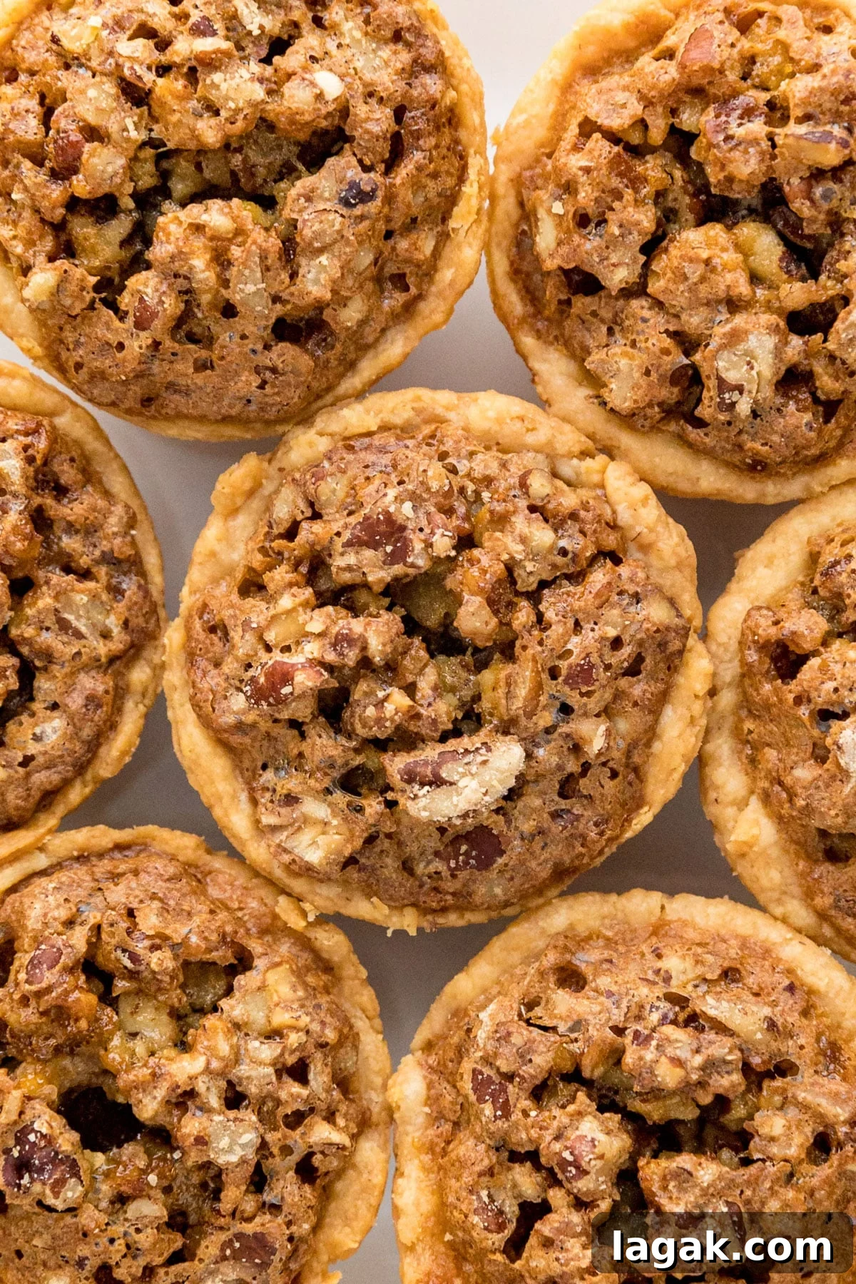 Grandma Rose’s Pecan Tassies Recipe for Perfect Bite-Sized Pies 3 A close up overhead image of pecan tassies.