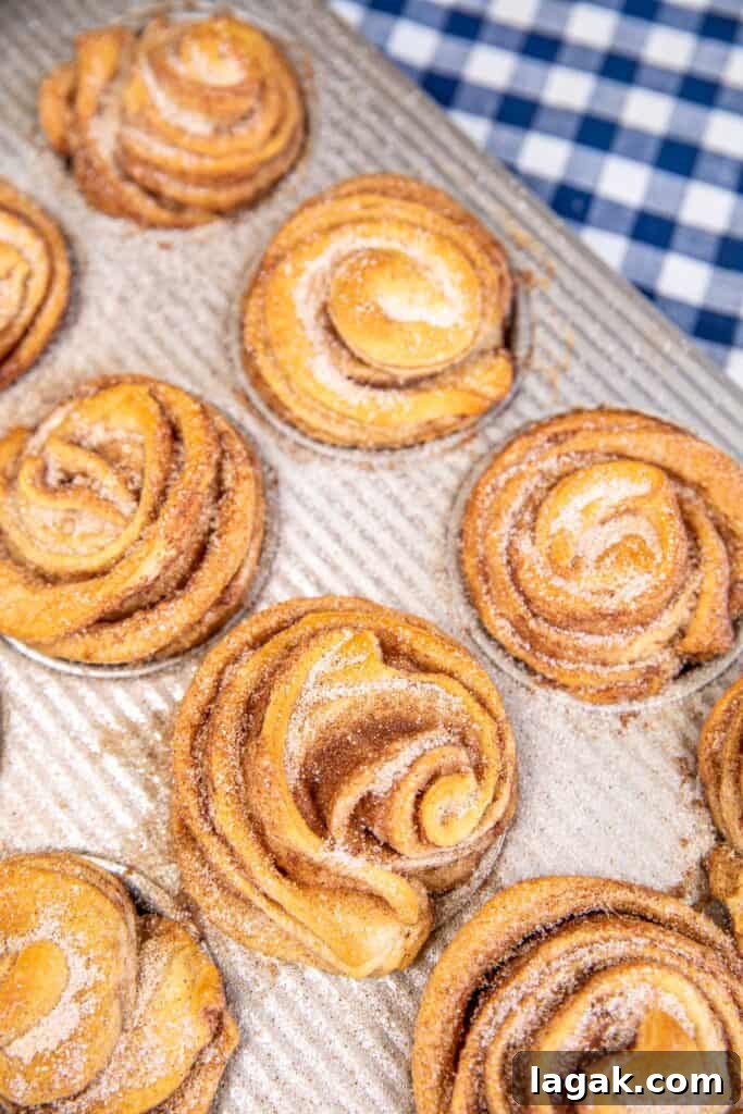 cinnamon sugar cruffins in a muffin pan