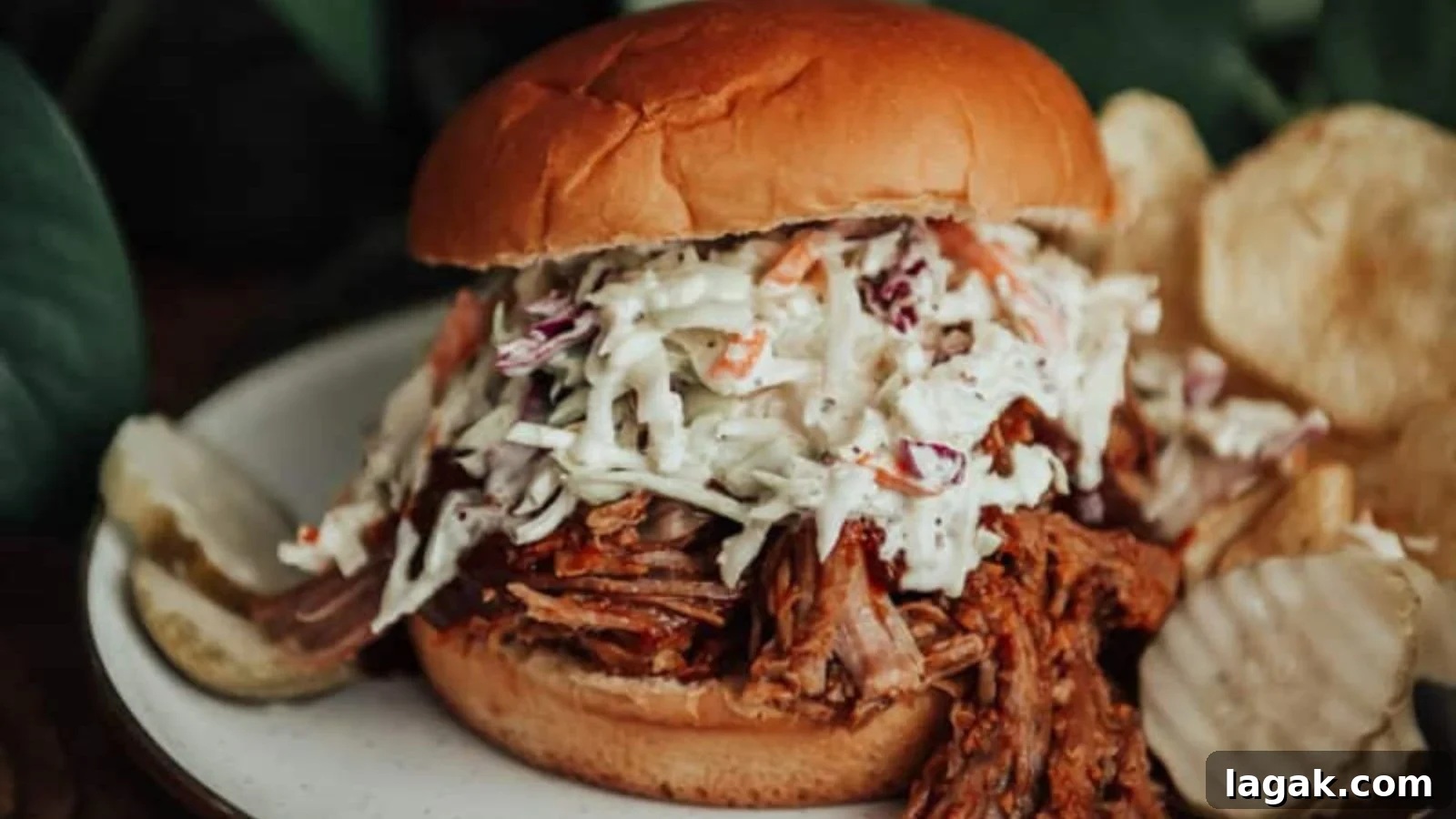 21 Slow Cooker Dinners for Stress-Free Weeknight Meals 12 Pulled pork cooked slow and shredded into tender pieces.