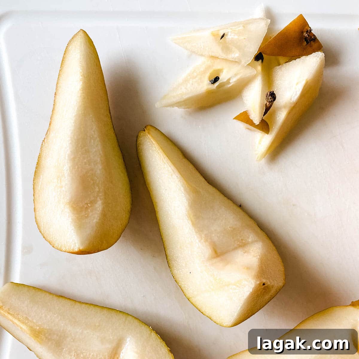 Air Fryer Cinnamon Pears Recipe 6 The seeds are removed from sliced pears.