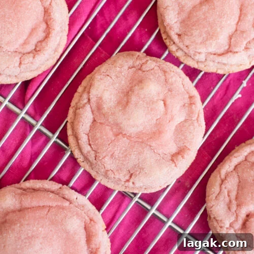 Strawberry Crinkle Cookies Recipe — Soft Pink Cookies for Spring 8 Soft, chewy pink strawberry crinkle cookies made with real homemade strawberry syrup. Perfect homemade Valentine’s Day treat or dessert for gifting and parties.