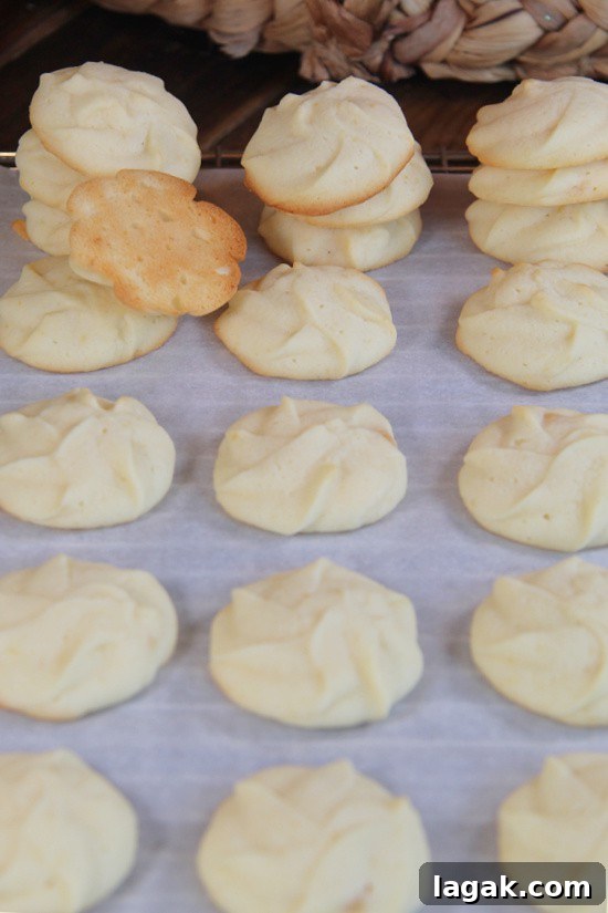 Homemade Butter Cookies are tender, buttery, and melt in your mouth. Stacks of cookie treats.