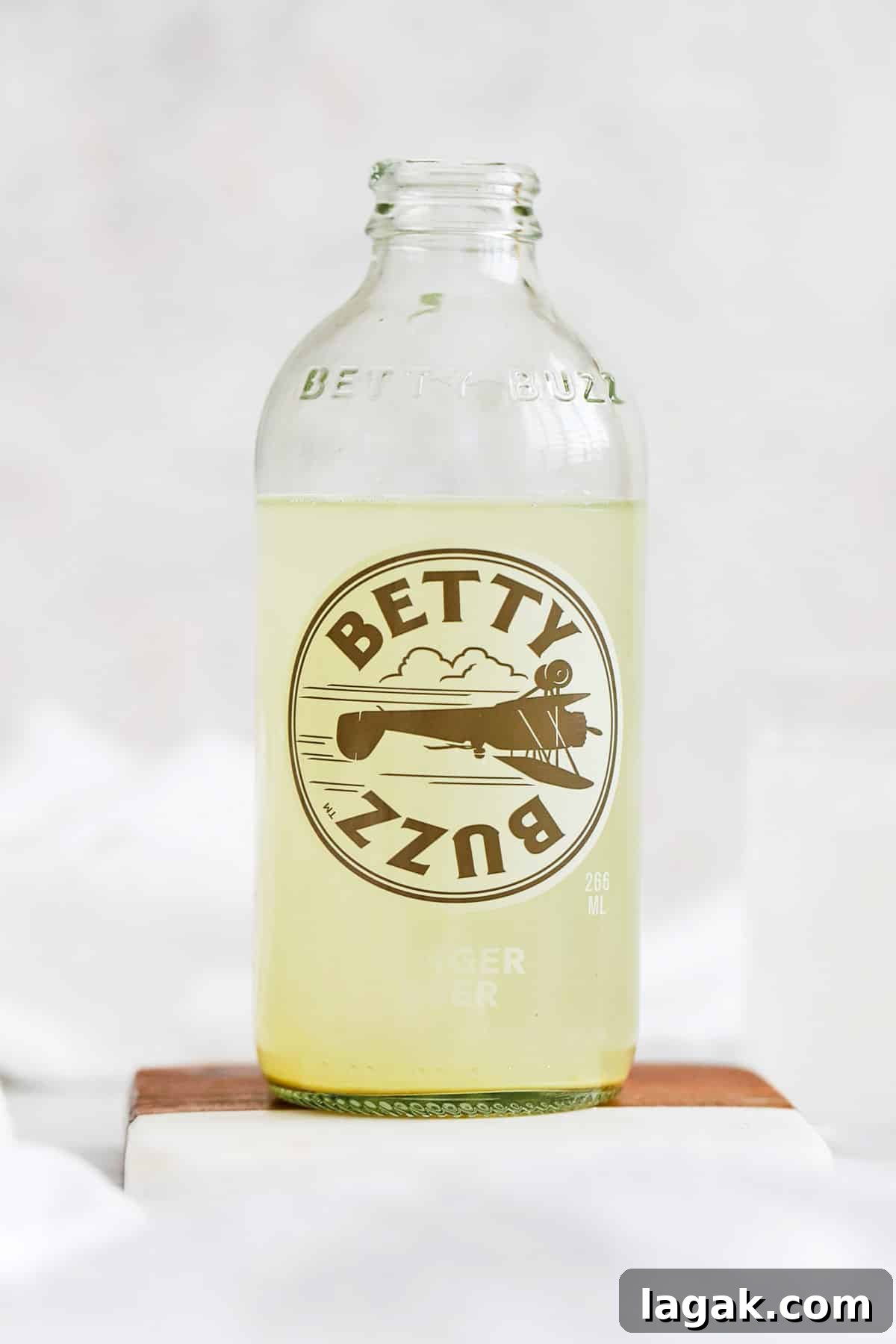 Top Ginger Beers for Crafting Perfect Mocktails 9 front view of a bottle of betty buzz ginger beer