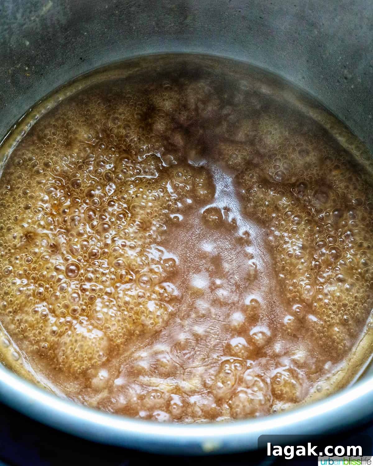 Tender Instant Pot Sirloin Tip Roast Recipe for Juicy Results 9 gravy bubbling and thickening in an Instant Pot.