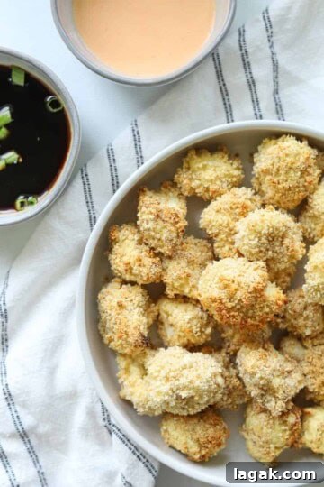 panko cauliflower with a side of soy sauce and sriracha mayo
