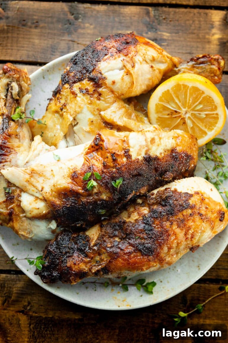 Crispy Air Fryer Whole Chicken Recipe (+ Step-by-Step Video) 3 deconstructed whole chicken with crispy skin and lemon