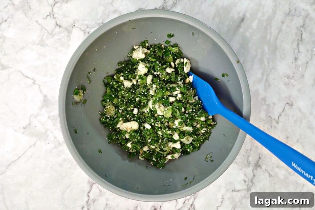 Spanakopita Grilled Cheese Sandwich (Air Fryer Greek-Style) 5 in a small bowl combine spinach, onions, feta, and seasonings
