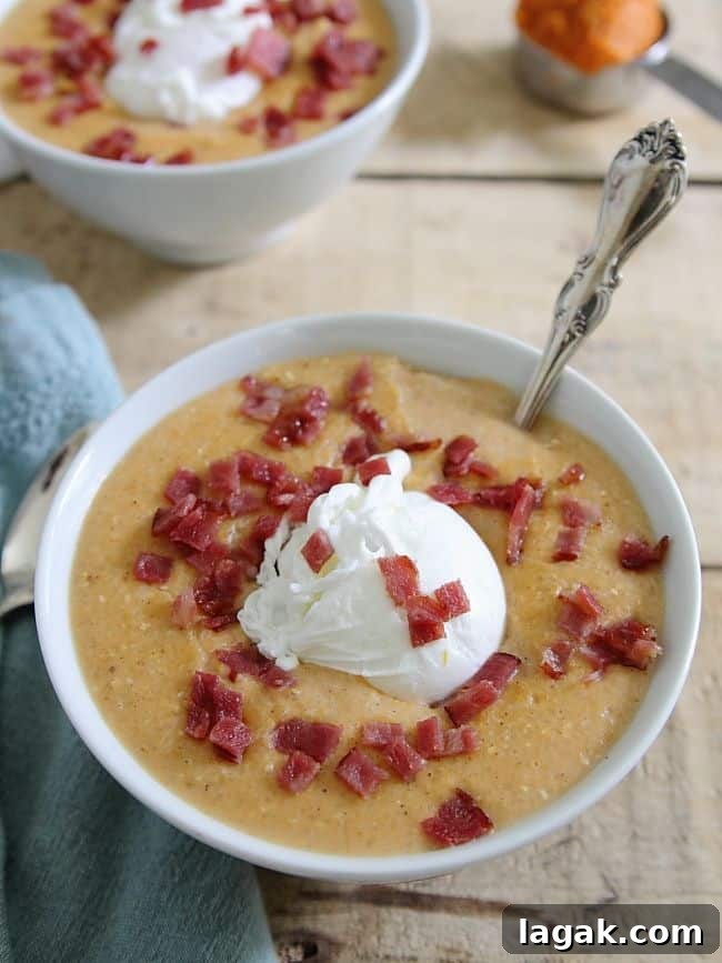 Pumpkin bacon grits topped with poached eggs