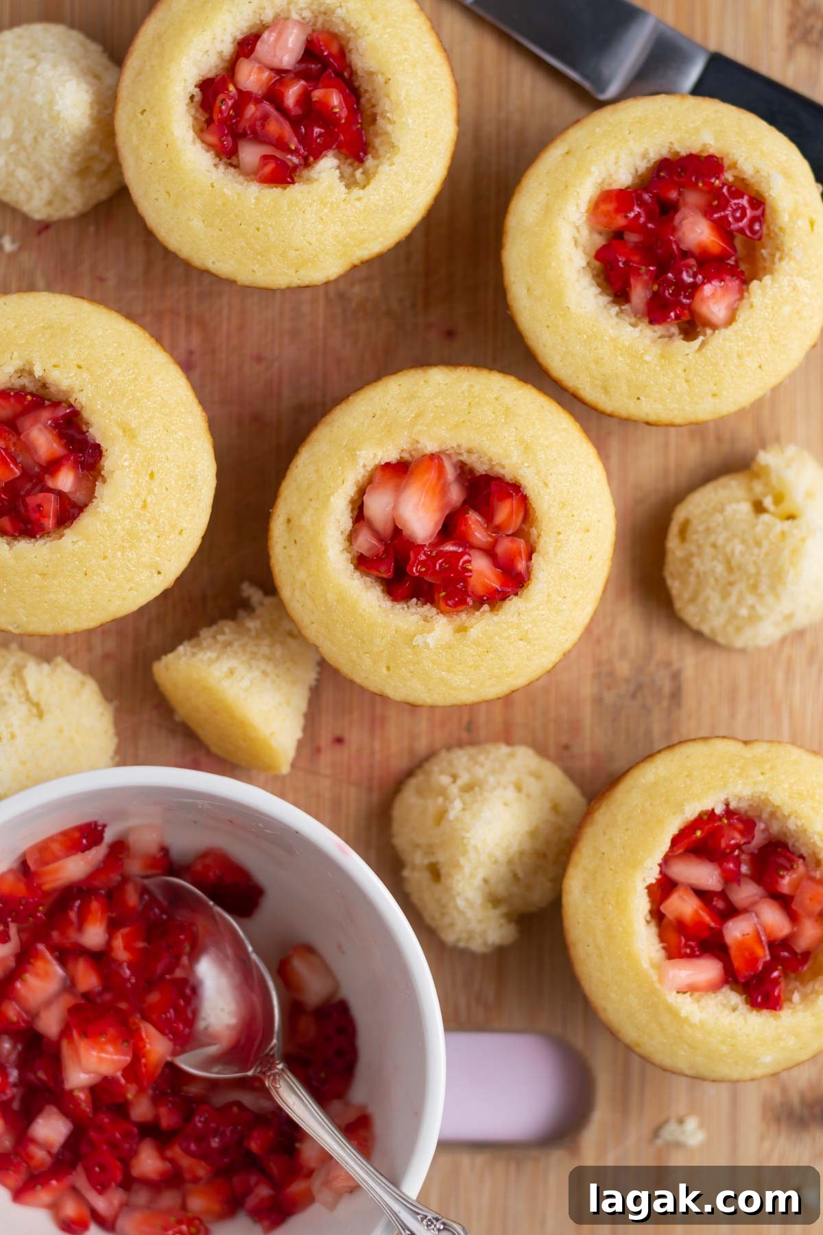 Strawberry filling inside the cupcakes.
