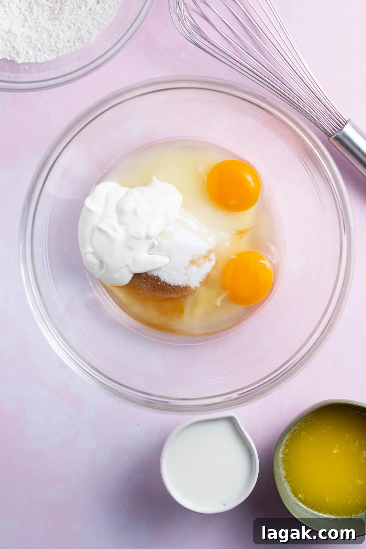 eggs, sour cream, sugar and vanilla in a bowl