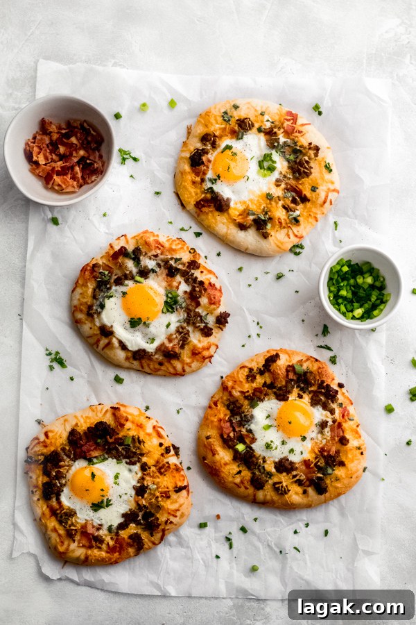 Breakfast pizzas garnished with parsley. Breakfast pizzas on a white surface, garnished with parsley.