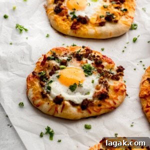 DIY Breakfast Pizza Recipes: Step-by-Step Guide to Morning Pizzas 2 A photo of the breakfast pizzas on parchment paper.