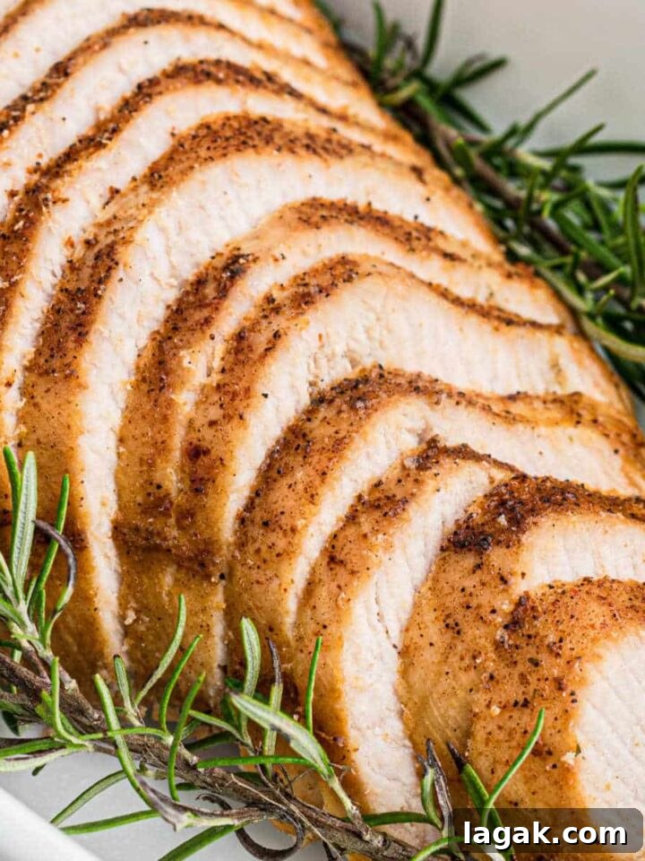 A sliced Cajun Turkey breast laid out sloping toward the camera.