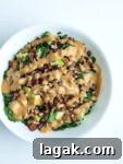 Autumn Kale Salad Recipe. This easy kale salad recipe will make your family beg them to serve them kale! The oil-free dressing is AMAZING. Gluten-free and vegan recipe.