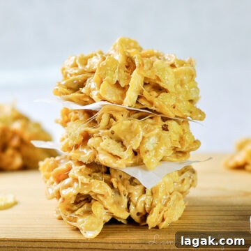 stack of no bake cookies on a cutting board.