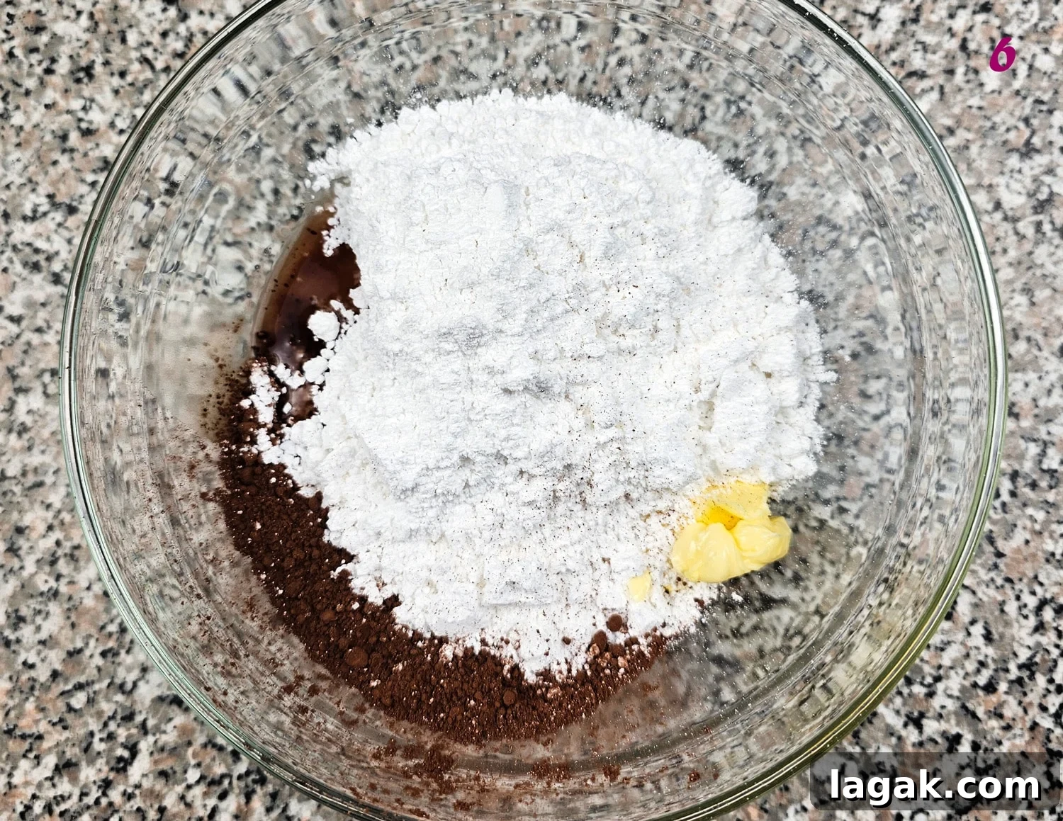 Hedgehog Cake Slice: No-Bake Chocolate & Biscuit Treat 9 Icing sugar, butter and cocoa in a bowl to make the hedgehog slice icing.