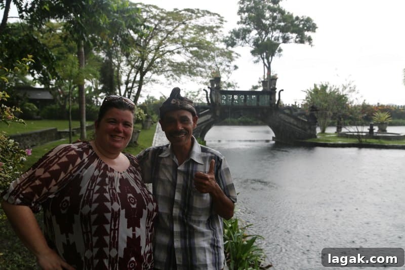 Tammilee and our Bali guide b the water and a bridge