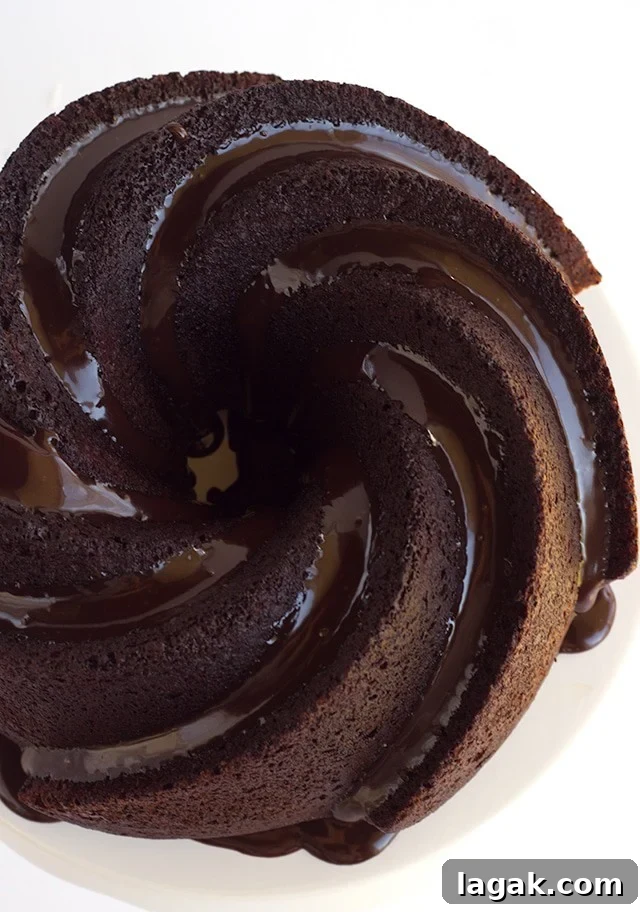 Whiskey infused chocolate bundt cake topped with a boozy chocolate ganache!