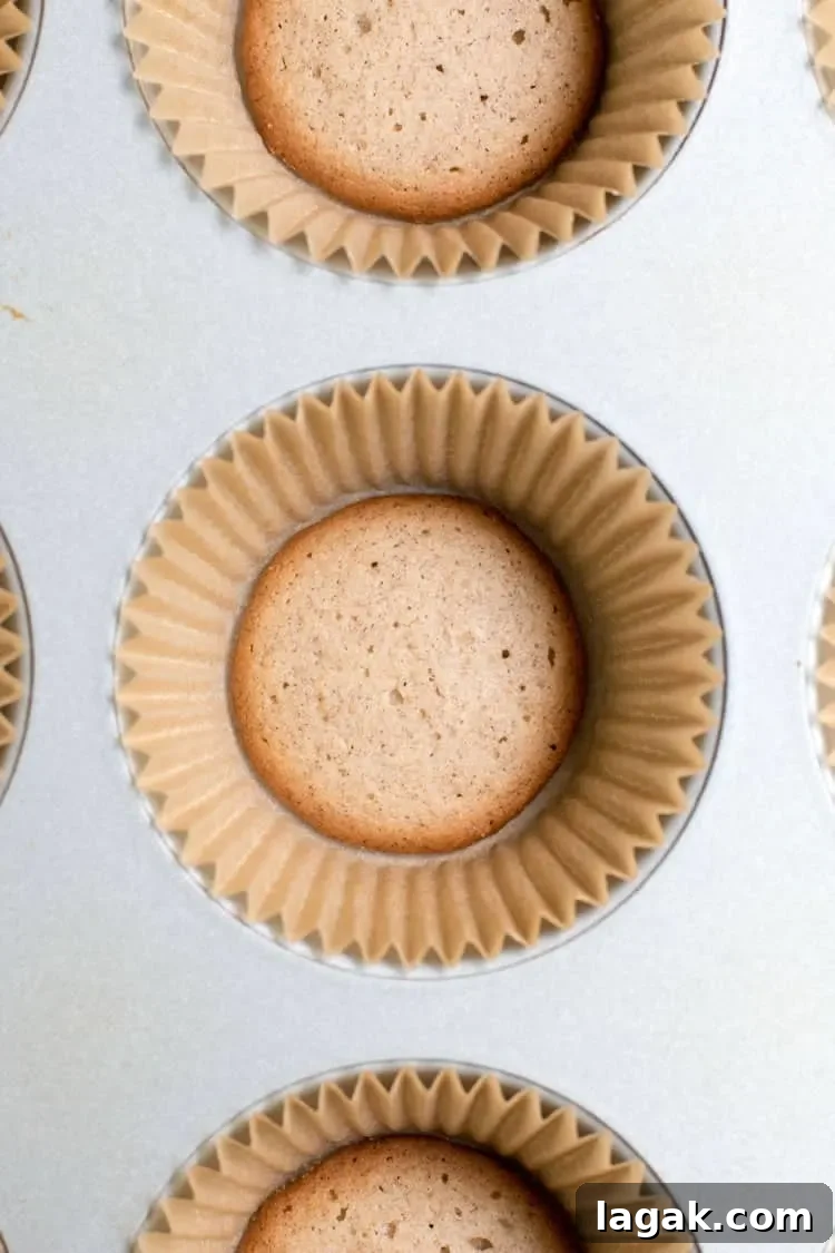 Stacked mini key lime pies garnished with lime slices