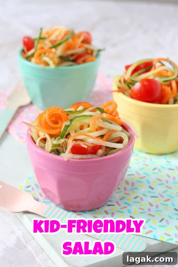 3 Spiralized salads served in small individual brightly coloured melamine pots.