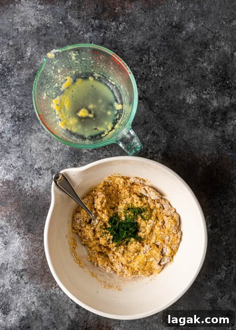 empty measuring cup with bowl of mixture and spices getting ready to form matzo balls