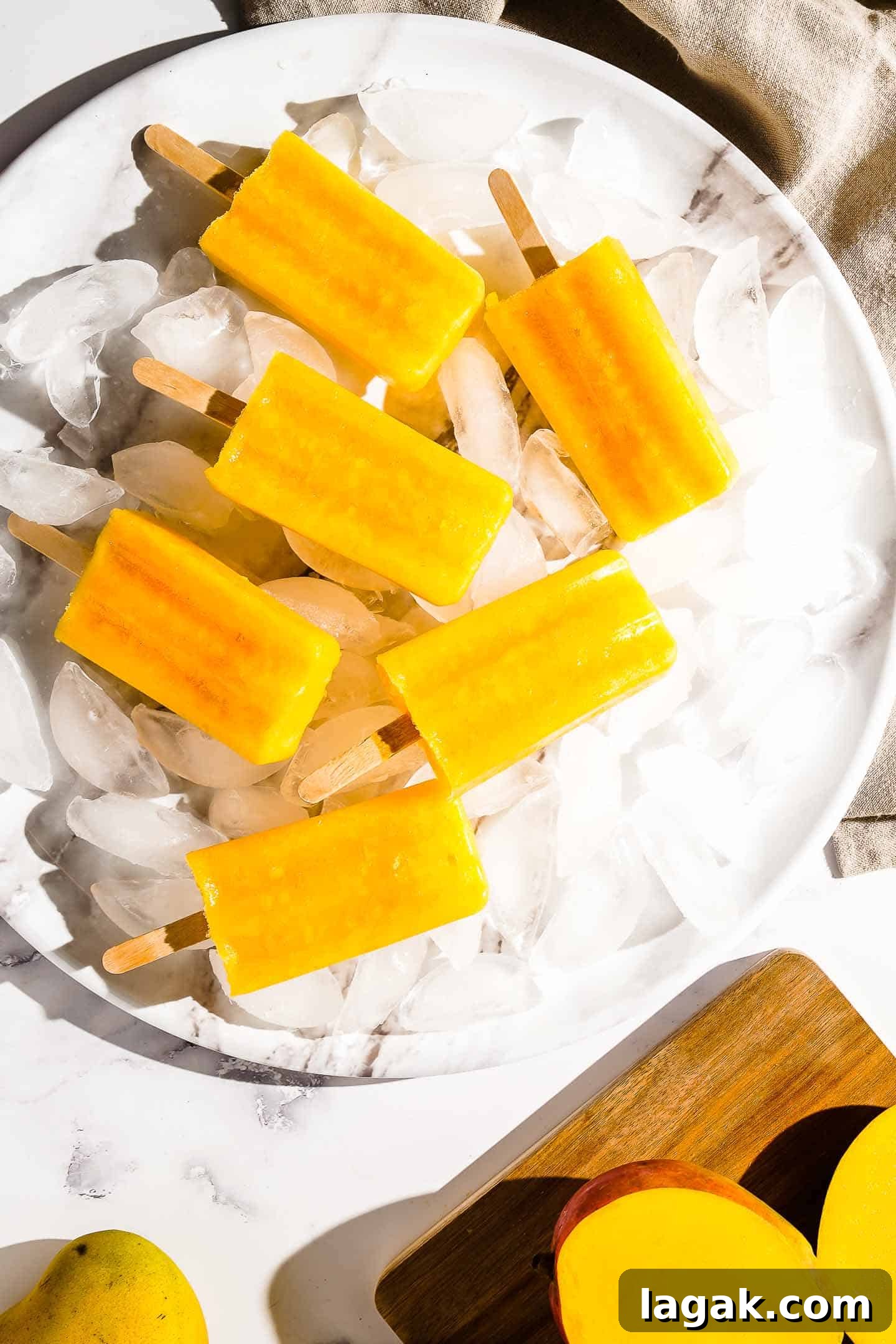 Mango Popsicles on Tray with Ice
