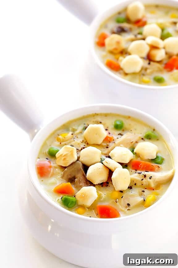 Chicken Pot Pie Soup Recipe -- easy to make, and inspired by the comfort food we all love | gimmesomeoven.com