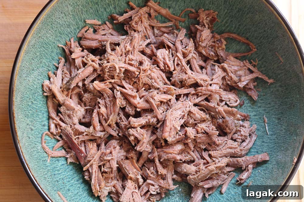 cooked shredded brisket in bowl