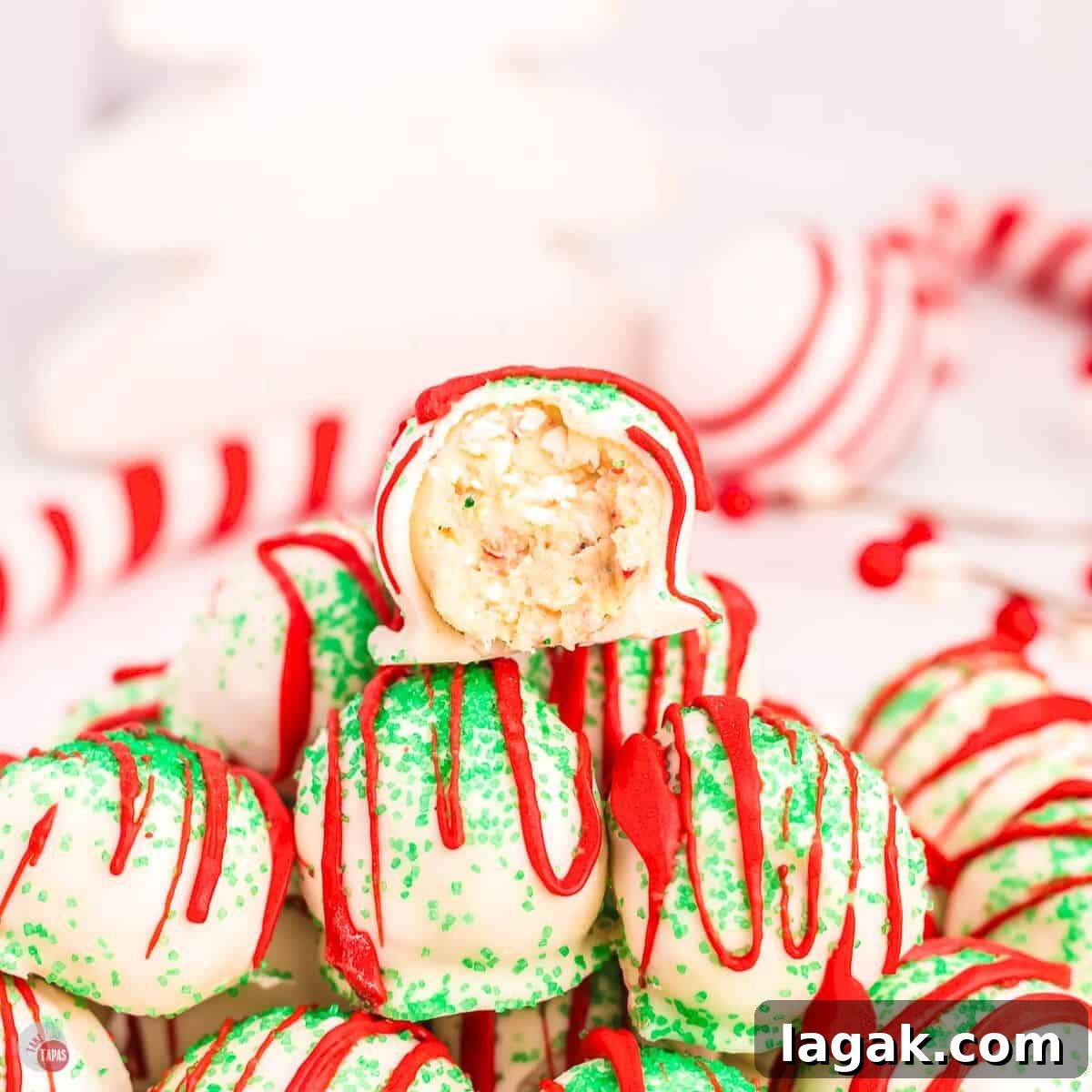 stack of cake balls with red and green decorations